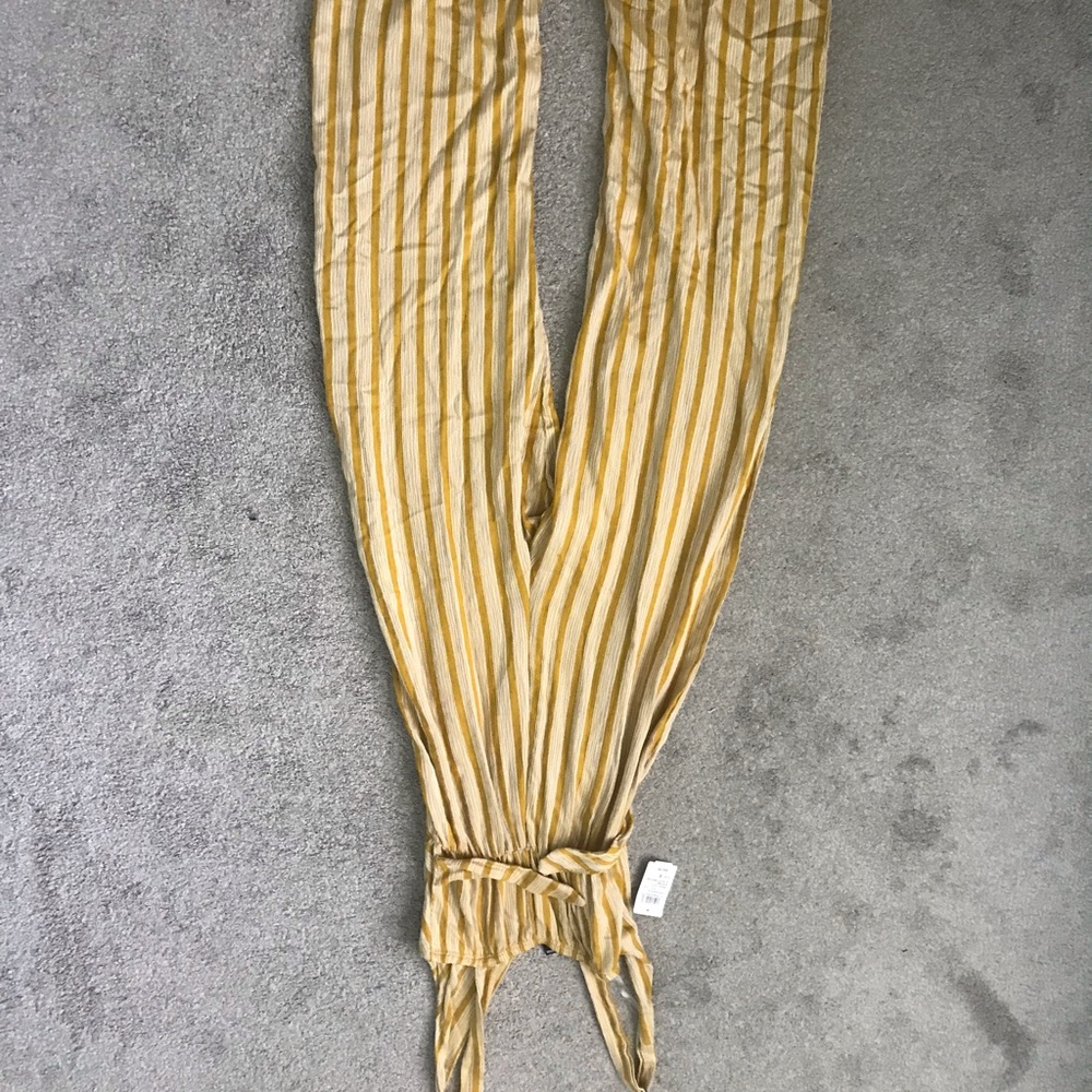 Yellow and white striped pantsuit